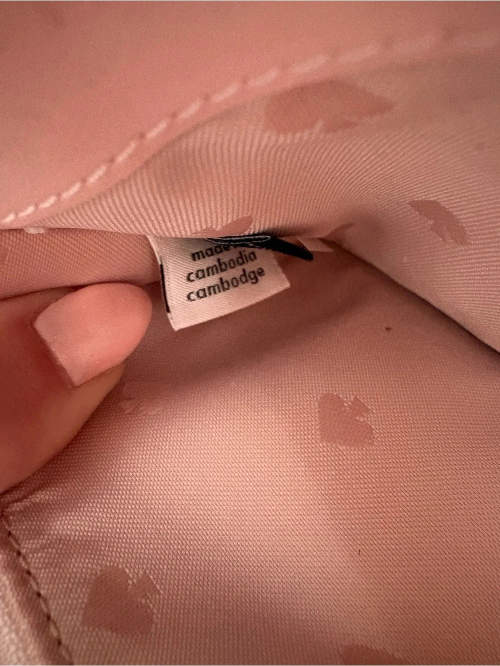 kate spade light pink zip-around wristlet wallet